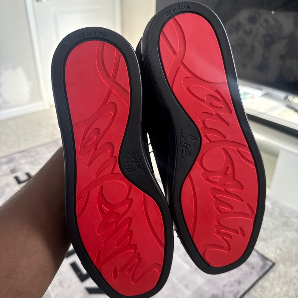 Christian Louboutin Black Sneakers with Vibrant Red Soles